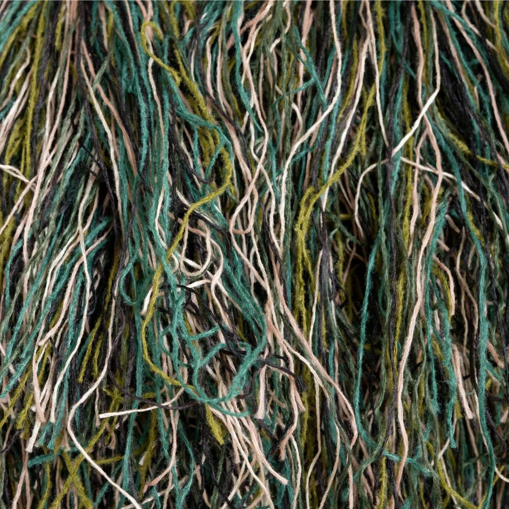 Closeup of Arcturus Woodland Mix Ghillie thread for ghillie suits